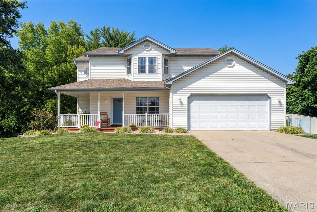 Welcome to this beautifully maintained 3-bedroom, 3-bathroom home offering a spacious layout, thoughtful updates, and plenty of room to live and entertain. Centrally located off Hartman Lane, this home is convenient to Highway 64, Fairview Heights, and O’Fallon, and is just 15 minutes from Scott AFB.
The main level features updated flooring, ceramic tile flooring in the bathrooms, and new ceiling fans throughout. A cozy gas fireplace creates a warm and inviting focal point in the living area. A versatile loft overlooks the two-story foyer and provides a perfect place for a home office or additional playroom. The well-appointed kitchen offers a large pantry for exceptional storage, while the primary suite provides added convenience with two generously sized closets. Downstairs, the basement is partially finished with a bonus room and lots of storage space. Bathroom plumbing is already completed, offering additional potential for a future finished living or recreation space.
Outside, enjoy a large lot with a dedicated dog run, storage shed, and plenty of room for outdoor activities, gardening, or entertaining. The 2024 water heater adds peace of mind to this move-in-ready home. With its spacious floor plan, desirable features, and versatile indoor and outdoor spaces, this home is ready to welcome its next owner. Information pulled from various sources. Buyer to verify MLS data.