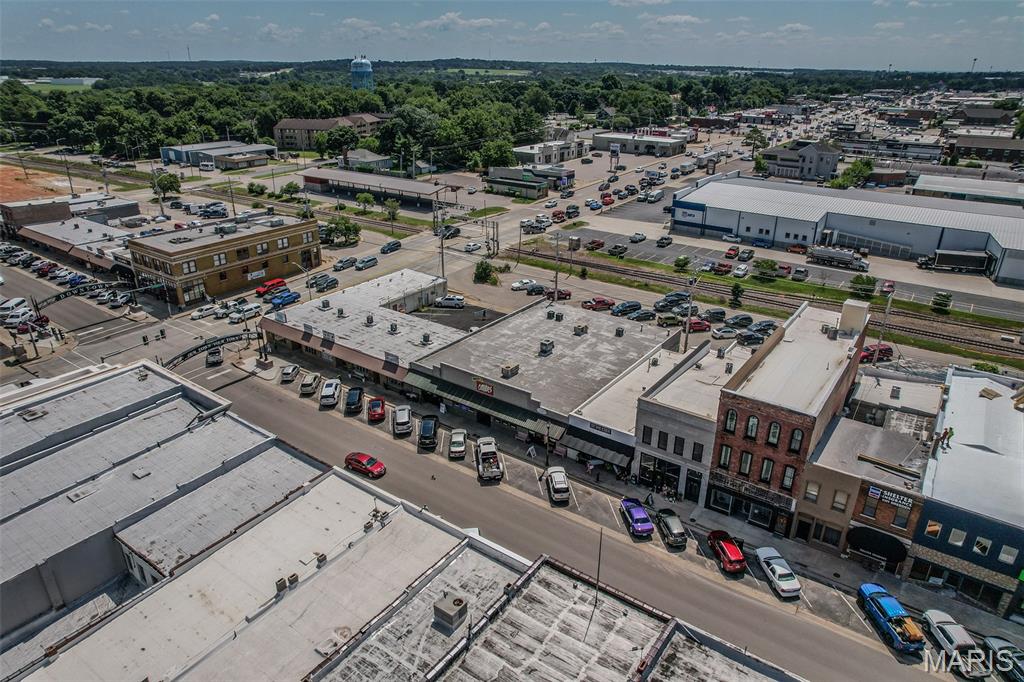 Take advantage of this turnkey investment opportunity located on highly visible Commercial Street in the heart of historic downtown Lebanon. This impressive 7,500 sq ft, 3-unit commercial building offers excellent visibility, foot traffic, and long-term potential in the city's most vibrant business district. Each unit features large storefront windows and flexible interior layouts—perfect for retail, office, or service-based businesses. All three units are currently leased, generating immediate income for the new owner. The building sits just steps away from local shops, restaurants, and community events, making this a sought-after location for both tenants and customers alike. Whether you're looking to expand your portfolio or secure a solid income-producing property, this is a rare chance to own a fully leased commercial asset in a growing downtown market.