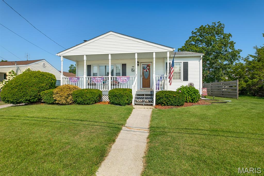 Checkout this 2 bed 1 bath home located on the edge of town.  Home features full basement, entire home has been rewired with new service, covered front porch, large covered back porch, open floor plan, asphalt driveway and 4 car detached garage.  Set your appointment today!!!