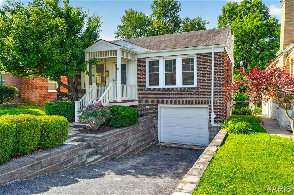 Adorable 2 bed, 1 bath brick home in Brentwood! Well maintained and updated. Enter the cozy living room with classic hardwood floors and cove ceiling. You'll find lots of space in each bedroom and more hardwood floors. The bathroom was remodeled just five years ago. Fully equipped kitchen with plenty of cabinets, granite counter tops and pantry closet. The surprise feature is the updated basement bonus room with luxury vinyl flooring - use as a family room, game room, office or additional sleeping area. There are newer vinyl windows throughout the house for increased comfort. The backyard is enhanced with a patio and fence. There is even a basement garage to fit a small vehicle or for additional storage. Come early to give this one a look before its gone!