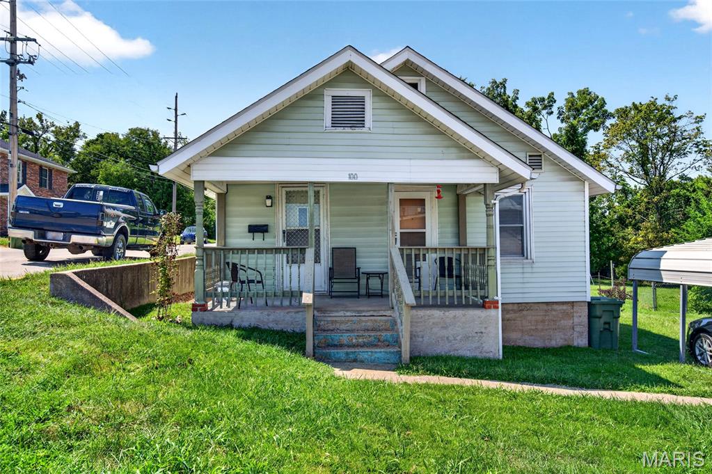 This is bigger than what you think!  4 bedroom home with extra space with so many possibilities!  Great covered front porch, living room, 2 bedrooms on the main floor, eat-in kitchen plus a TV room or office space.  Then upstairs, there are 2 other bedrooms plus a family/living/game room space between.  Zoned R2 for one or two family.  Just one block off of Bishop (Highway 63).  This is a nice, maintained and loved home.