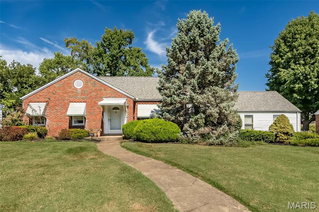 Welcome to this charming 1.5-story home in the heart of Affton, where classic character meets incredible potential. Set on a sprawling, level lot of nearly half an acre, this property offers the kind of outdoor space that is truly hard to find.

Inside, the home is filled with natural light that highlights the beautiful hardwood floors running through the entire spacious main floor. With three bedrooms and a functional layout, the bones are excellent and the heavy lifting has already been done—you can move in with peace of mind knowing the electric, HVAC, and hot water heater have all been recently updated.

The interior is just waiting for your finishing touches to truly shine. Whether you want to modernize the kitchen or fully realize the potential of the partially finished lower level, there is plenty of room here to build sweat equity and create a space that is uniquely yours.

If you love to entertain, the backyard is the undisputed star of the show. The massive, covered pavilion comes equipped with electric, making it the ultimate setup for summer BBQs, game day watch parties, or just relaxing in the shade while enjoying the privacy of the fully fenced yard. A two-car garage provides extra convenience and storage.

Located with easy access to a variety of local dining favorites, shopping, and parks, this home combines a fantastic location with a lot size that feels like a private retreat. Bring your vision and make this Affton gem your own.