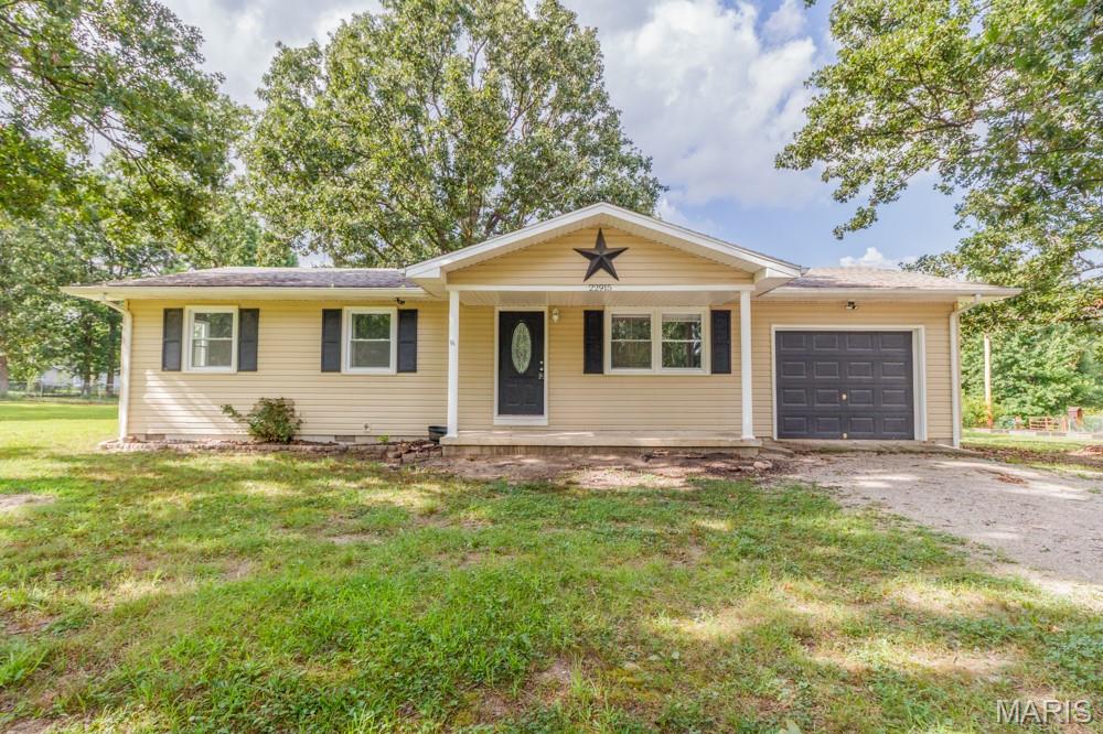 Welcome to this adorable 3 bedroom 2 bath home situated on a spacious .65 acre lot on the south side of town and located OUTSIDE of the city limits. This house is all electric with central heat and air, vinyl siding, a nice deck off the back and a utility shed with an area for fido to enjoy the outdoors when you are away.  This property features a 24 x 32 shop with concrete floor and is a versatile space with endless possibilities for hobbies or storage. Whether you are a first time homebuyer or needing to downsize this may be the perfect place for you.