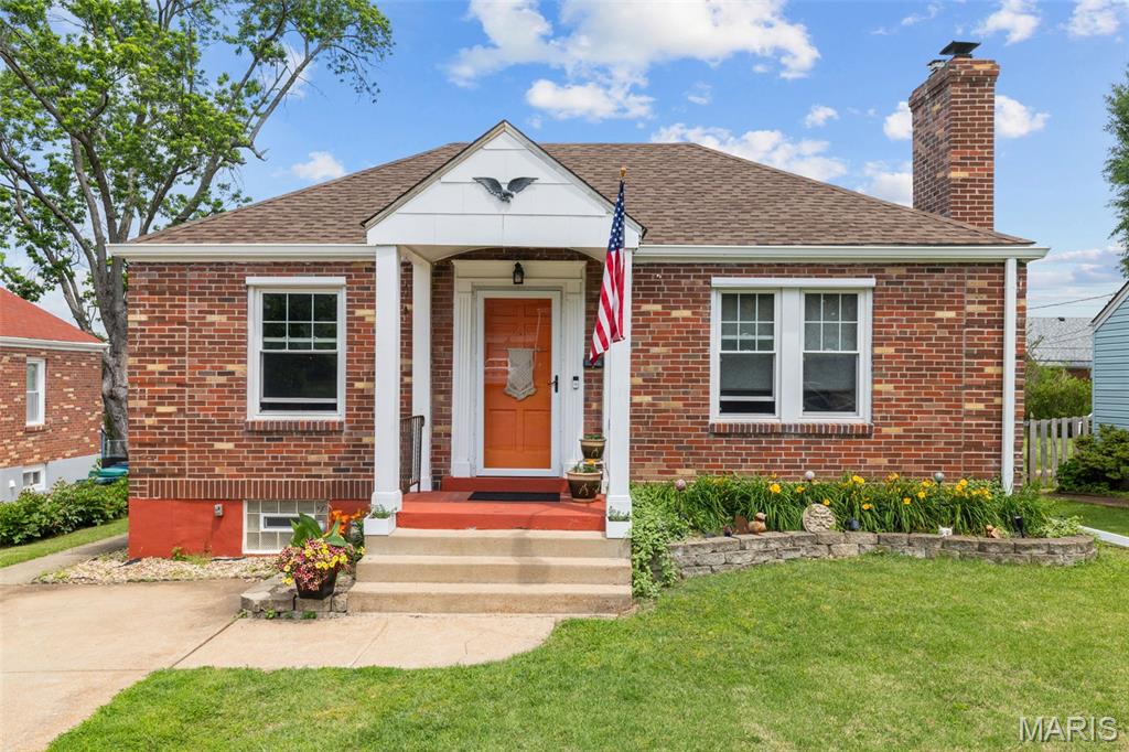 Look no further than this charming and updated brick bungalow in Wilbur Park, just moments from Bayless Schools! A covered porch and great landscaping create curb appeal and welcome you inside. The foyer has archways opening to the bright living room and dining room. You'll love the hardwood floors, stained glass windows, stone fireplace, and wood millwork. The updated kitchen offers modern convenience while blending seamlessly with the class style of the home. You'll have granite counters, stainless steel appliances, a tile backsplash, and glass-front cabinets. A breakfast bar connects the kitchen with the dining nook, featuring a cozy window seat. A bath with tile-surround tub and bedroom with stained-glass windows complete the main level. The finished basement adds a sleeping area/office and another bathroom with a step-in shower, plus space for storage. Enjoy summer on the patio overlooking the fenced backyard. With all of the restaurants and shops along Gravois nearby, as well as quick access to I-55, parks, and schools, this home is in a great location. Don't miss out!