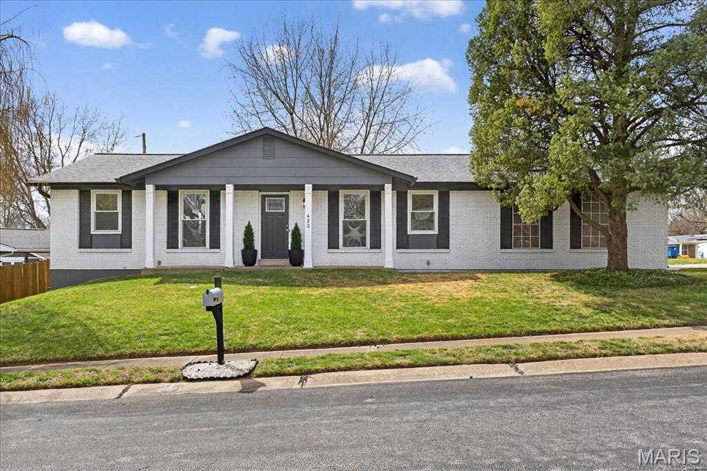 Welcome to 423 Quentin Drive! This 3 bedroom, 3 bath ranch home has been freshly painted and thoughtfully updated throughout. Situated on a private corner lot, this property features an oversized two-car garage, a charming interior, and a beautiful fully fenced yard perfect for outdoor enjoyment! The main level offers an inviting and functional layout with a comfortable living room that flows seamlessly into the breakfast area, and bright & sunny kitchen, complete with recessed lighting, center island, pantry, and granite countertops.   The primary suite features a bay window and a private ensuite bathroom. The partially finished lower level adds even more versatility, offering a spacious recreational area and an additional full bathroom—ideal for entertaining guests or a home office setup. Don’t miss the opportunity to make this charming home yours!