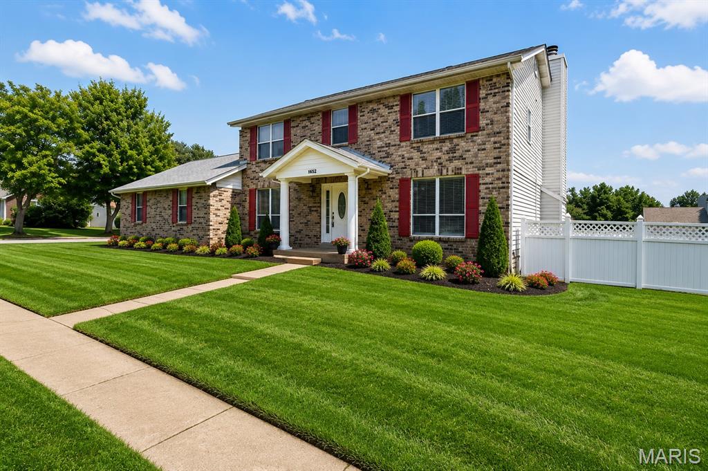 Stunning 2-story home with a beautifully finished lower level loaded with upgrades, custom features, and exceptional living space throughout! This impressive home showcases gorgeous hardwood and tile flooring, elegant crown molding, upgraded lighting, and an abundance of recessed lighting throughout the home. The spacious family room features a dramatic 5-window bay, while the breakfast room offers an additional 3-window bay providing abundant natural light. The chef’s kitchen includes granite countertops, stainless steel appliances, maple cabinetry, center island, and newer dishwasher and range less than 3 years old. Main-floor office/den with French doors is perfect for working from home. Convenient oversized laundry room includes sink and vanity. The luxurious primary suite offers a jetted tub, tall vanities, and a spa-like bath. The 4th bedroom features a walk-in closet. The finished lower level is ideal for entertaining with an impressive rec/media room, custom wet bar accented with wainscoting and tilework, bonus room, and full bath. Additional highlights include a 3-car garage with extra storage space and service door to the backyard, composite deck, and large corner lot. A truly exceptional home offering space, style, and comfort!