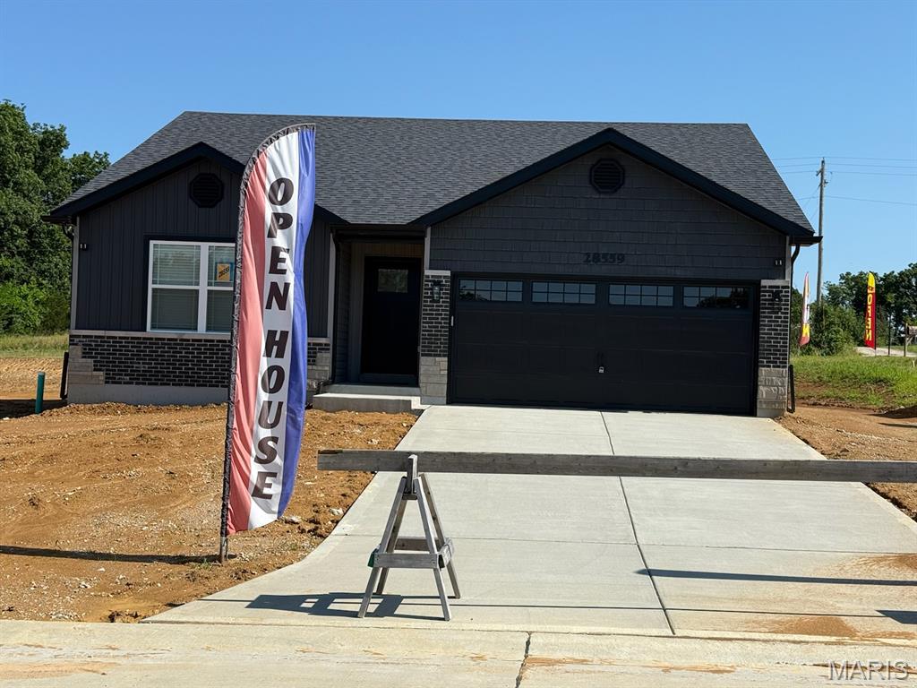 BRAND NEW home with every option you could imagine! They include vaulted ceilings, rounded “bullnose” corners, granite or quartz countertops, stainless steel appliances, 42" cabinets with "cushion close", custom neutral-colored paint job throughout, LVT flooring throughout most of the home, framed windows, taller baseboards, adult-sized cabinets in bathrooms with marble countertops, walk-in closets, main floor laundry, upgraded carriage garage doors with openers on 2 CAR Garage, full bath rough-in, panel doors (many varieties), and upgraded water/light fixtures throughout the house! Fully sodded yard (front/sides/back). *Pictures are of previously built homes. Builder/Broker* This home is USDA eligible