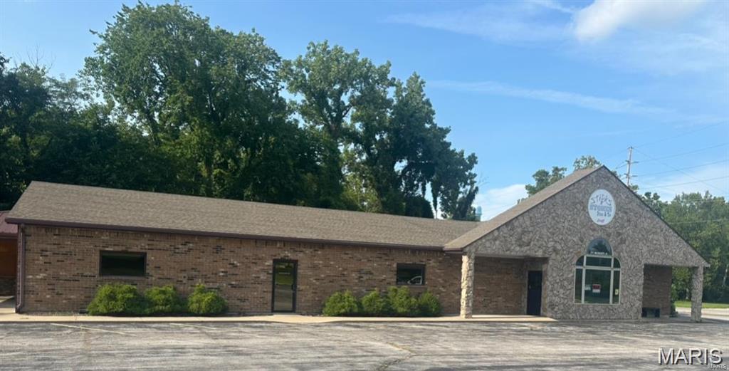 Investors Alert!  This property sits on 4.1 acres and is set up with equipment which can be negotiated. The 6360 square foot building was previously a restaurant and is waiting for new owners right here in a historical area known as America's Hometown, in Hannibal, MO. There are 75 parking spaces, including 4 handicapped and enough space for buses as well. The outdoor patio with its own bar, a stage for live music, auctions ect. and a sand volleyball court for leagues which is additional income is the perfect setting for some outdoor fun. The large private party/meeting room sits off of the formal dining room and there is enough space to accommodate small or large groups  in addition to being able to seat over 250 people in this building. Whether your dream is to own a restaurant, put a daycare in, assisted living, or something else, this is your chance to make your dreams come true. Call for more information or a showing. Location: City