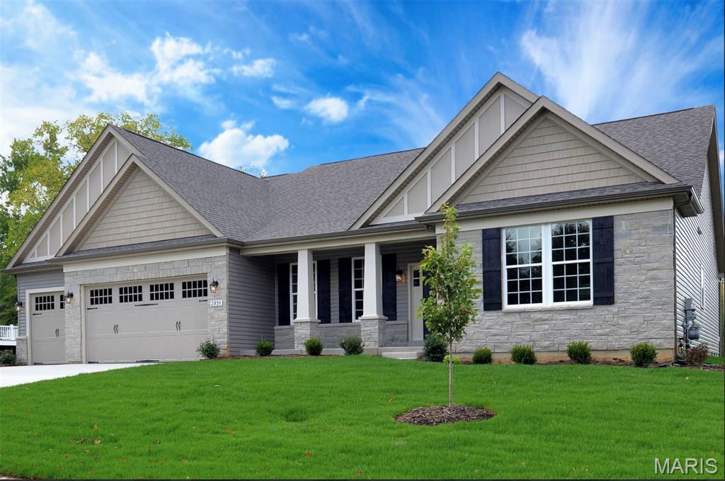 For a limited time take 25,000 in flex cash toward your new home. The Monaco from Rolwes Company’s Estate Series is a beautifully designed ranch home that combines elegance, and functionality for today’s modern lifestyle. This to-be-built floor plan features three bedrooms and two-and-a-half baths, beginning with a stunning foyer that opens to a formal dining room, and spacious gathering room—perfect for entertaining. At the heart of the home is a large kitchen with an oversized island and walk-in pantry. The private owner’s suite offers a luxurious bath with double sinks, a garden tub, and a separate shower, along with a generous walk-in closet. Two additional bedrooms share a Jack & Jill bath, and a convenient half bath and laundry room complete the main level. Personalize your Monaco with options a hearth room, an owner’s retreat, a covered patio, or a private study. Select floor plans can also accommodate extended garages for boat storage, and the oversized lots allow space for an optional detached garage. As part of the Lake St. Louis Community Association, homeowners enjoy full lake rights, clubhouse access, on-site dining, and community beaches, with additional amenities including golf, tennis, pickleball, fitness center, and pool access available. Every Rolwes Company home includes enclosed soffits and fascia, a fully sodded yard, and a professional landscape package for lasting curb appeal. Images shown may reflect optional features. Please see your Sales Representative for a complete list of included features and community details.