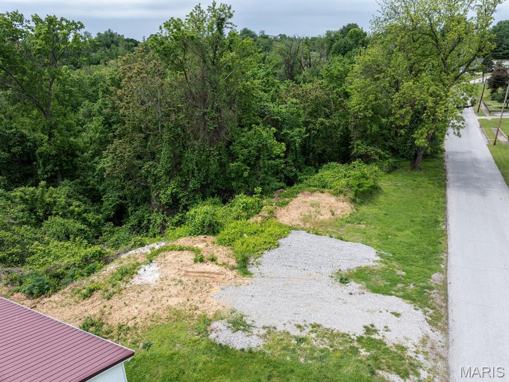 Large city lot in established neighborhood!