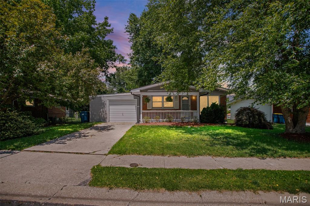 Adorable brick ranch that’s completely move-in ready and located in the established Montclair subdivision!
Enjoy relaxing on the covered front porch or entertaining in the spacious backyard featuring a deck with newer AstroTurf. The attached garage provides convenient parking and extra storage space. Inside, the spacious living room offers updated laminate flooring and a large picture window for plenty of natural light. The home includes 3 bedrooms with beautiful hardwood floors and a full bath conveniently located nearby. The eat-in kitchen features:
Separate dining area, Pantry, Updated countertops and sink, Included appliances
Just off the kitchen, you’ll find a large family room filled with windows and natural light.
The partially finished full basement adds valuable extra living space with: Bonus room, Additional family room, Second bathroom and lots of storage.
The laundry area includes a newer utility sink, refrigerator, and brand-new washer and dryer. This home is a must-see!
Deck AstroTurf is new. Roof is approximately 2.5 years old  HVAC are 14 years old.