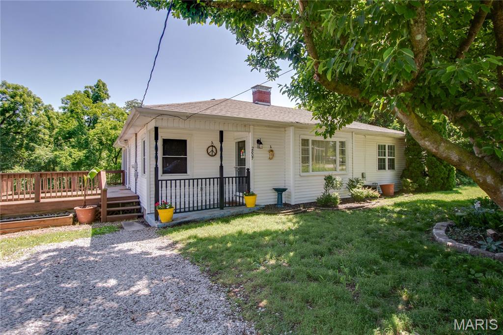 Move right in and start enjoying all this well-maintained 3-bedroom, 2-bath home has to offer! Conveniently located, this home features fresh paint throughout, brand-new carpet, and several major updates already completed, including a furnace and A/C replaced in 2012 and a roof that is approximately 10 years old.
The spacious living room features a wood-burning fireplace, while the kitchen comes complete with appliances that will stay with the home. The real showstopper is the outdoor living space. Step outside to a large deck and an impressive screened-in porch with vaulted ceilings—perfect for entertaining, relaxing, or simply enjoying views of the large backyard.
The walkout basement offers a laundry area along with plenty of opportunity to add additional finished living space to suit your needs. Whether you’re looking for extra room to spread out now or space to grow into later, this home offers flexibility, updates, and a location that’s hard to beat.