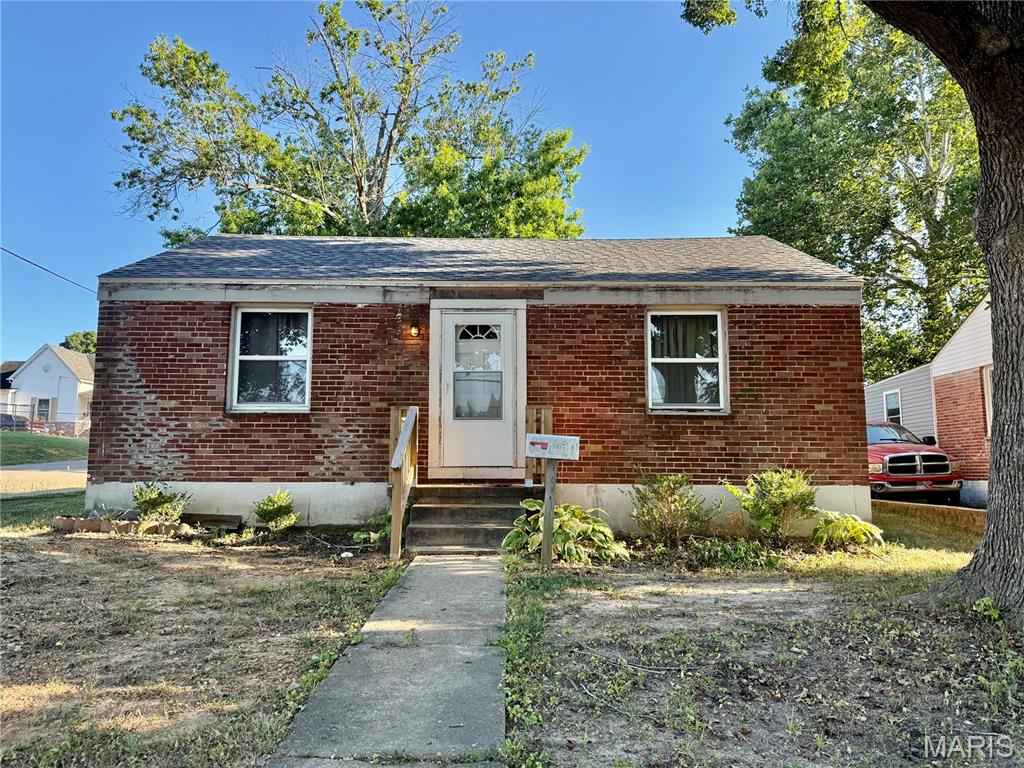 New High Effiecent Furnace, New Electric Water Heater, Brick Home, large corner lot 50'x200', Great rental property or starter home being sold As-Is, no repairs to be done by seller, Cash only. Basement foundation issues.