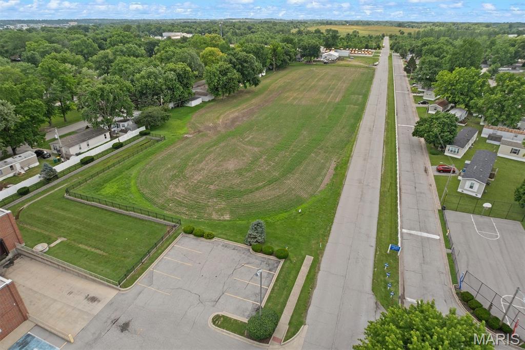 RARE LAND OPPORTUNITY!  Unlock the potential of this exceptional 3.68 - Acre parcel offering a rare combination of location, versatility, and opportunity.  Situated in a highly desirable area, this level tract of Commercial land is zoned Agricultural and Special Use, providing a variety of possibilities for investors, developers, business owners, or those seeking a strategic land investment. Located in a prime, high-visibility location that is just 2 miles from I-64 and minutes from Scott AFB, this property is ready for its new owner.  Whether you're looking to expand your portfolio, establish a business presence, or secure land for future plans, opportunities like this are becoming increasingly difficult to find.  Don't miss your chance to own a sizable parcel in a sought-after location with endless potential.  Schedule your tour today and explore the possibilities that await at 120 & 134 St. Ellen Mine Road.  Acres and taxes reflect totals for both parcels.