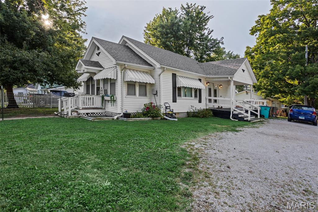 Welcome to 702 W. Jefferson Street in Pittsfield! This well-maintained 3-bedroom, 1.5 bath home sits on a corner lot and offers the perfect combination of comfort and functionality. Inside, you'll find a bright, open layout connecting the living room and kitchen, creating a welcoming space for everyday living. Beautiful hardwood floors add warmth and character throughout much of the home, while the kitchen features ample cabinet storage, a functional layout, and all appliances are included. The partially finished basement provides additional flexible living space that's ideal for a family room, rec room, home office, or hobby area. Outside, you'll appreciate the 24' x 24' detached garage, offering plenty of room for vehicles, storage, or a workshop. If you're looking for a move-in ready home with timeless charm and versatile living space, this one is a must-see. Schedule your private showing today!