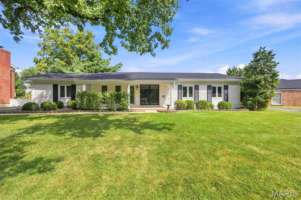 Welcome to 165 Saddleford Drive, where beautifully updated spaces and a thoughtfully opened floor plan create a home designed for both everyday living and entertaining. At the heart of the home is the renovated chef’s kitchen, featuring an oversized center island, updated cabinetry, new appliances, and plenty of room to gather. The kitchen flows seamlessly into the surrounding living and dining spaces, creating the open, connected feel everyone wants. Updated flooring runs throughout the home, complemented by abundant natural light, beautiful millwork, and replaced windows. All three bathrooms have been updated, including the private ensuite in the spacious primary. The finished lower level adds even more living space, including an additional room and half bath—perfect for a home office, playroom, craft room, workout space, or whatever fits your lifestyle. Outside, enjoy front porch living on a cul-du-sac while the backyard offers plenty of space to relax, play, or entertain. Located in the Parkway School District with convenient access to Chesterfield Valley shopping and dining, Faust Park, and I-64/US-40. Major improvements add even more value, including furnace and AC replaced in 2023, range in 2025, and a new roof and garage door in 2026. Beautifully updated, exceptionally functional, and ready for its next chapter!