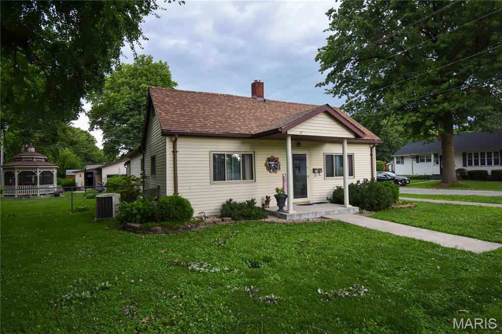 This well-maintained home offers comfortable single-level living with 2 bedrooms and the potential for a 3rd—simply reinstall a closet in the additional room with built-ins to easily convert it back. The layout features a generously sized dining room and an inviting kitchen, ideal for everyday living and entertaining.
A standout feature is the year-round sunroom that fills with natural light and provides a seamless transition to the backyard. Recently upgraded with a mini split system, it ensures comfort in every season.
Step outside to a truly impressive outdoor space. The fully fenced backyard sits on an extra-large approximately half-acre corner lot, offering privacy, space, and flexibility. Enjoy relaxing or entertaining in the screened-in gazebo, complete with electric service and a ceiling fan for added comfort during warmer months.
Storage and parking are abundant, with a garage accommodating two vehicles, plus additional sheds and carports for all your needs.
Recent updates provide peace of mind, including a brand-new roof installed within the last year. With its thoughtful improvements, spacious lot, and versatile indoor and outdoor living areas, this home is move-in ready and full of potential.