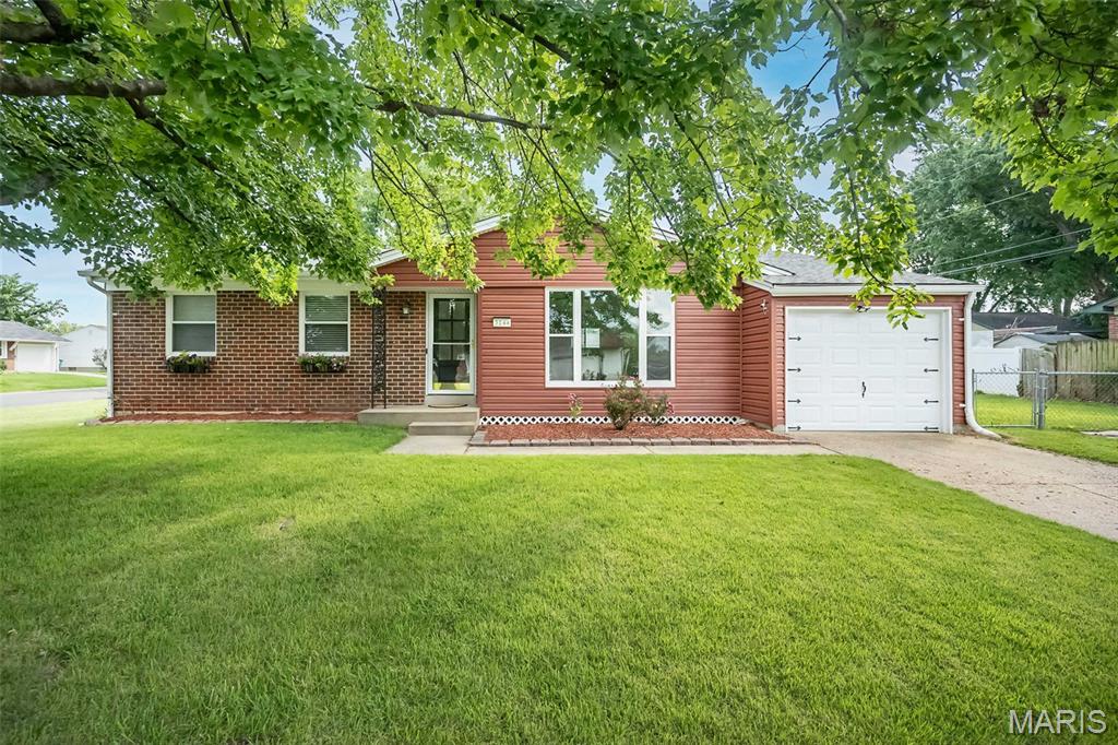Looking for a home that's equal parts stylish and practical? You've found it! This beautifully updated ranch is bursting with charm from the moment you arrive. Step inside to an inviting open floor plan featuring durable luxury vinyl flooring, amazing natural light, and plenty of room to gather with family and friends. The showstopper kitchen steals the spotlight with custom cabinetry, soft close, sleek countertops, stainless steel appliances, eye-catching tile backsplash, gas range, pantry with pull out drawers, and generous storage —proving you don't have to sacrifice style for affordability! Three comfortable bedrooms and two full baths provide everyday convenience, while the finished lower-level recreation room offers the perfect space for movie nights, game days, a home gym, or playroom. Still need more room? The unfinished portion of the basement is ready for your ideas, whether that's a workshop, storage, or future finished living space. Outside, enjoy a covered patio overlooking the level backyard—ideal for relaxing evenings, weekend BBQs, or letting kids and pets play. Conveniently located with easy access to shopping, dining, parks, and highways, this home is the perfect place to begin your next chapter! Seller is including a one-year home protection plan for added peace of mind. Stylish, affordable, and full of charm—homes like this don't stay available for long!