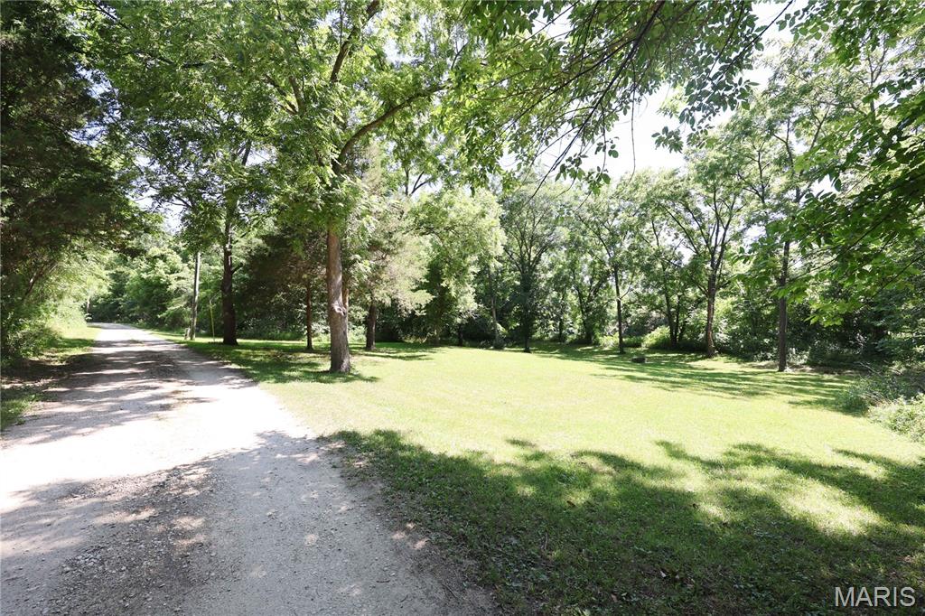 Escape to the beauty of Apple Creek with this approximately .48± acre recreational property located at 562 Apple Creek Lane in Old Appleton, Missouri. Featuring direct access to Apple Creek, this mostly open tract offers the perfect setting to relax, unwind, and enjoy the outdoors.

With a few mature trees providing shade and character, the property is well-suited for camping, weekend getaways, or creating your own private recreational retreat. An existing fire pit makes it easy to gather with family and friends while enjoying peaceful evenings by the creek.

Whether you're looking for a place to fish, explore nature, or simply enjoy the quiet surroundings, this unique property offers an excellent opportunity to own a piece of Perry County's scenic countryside.