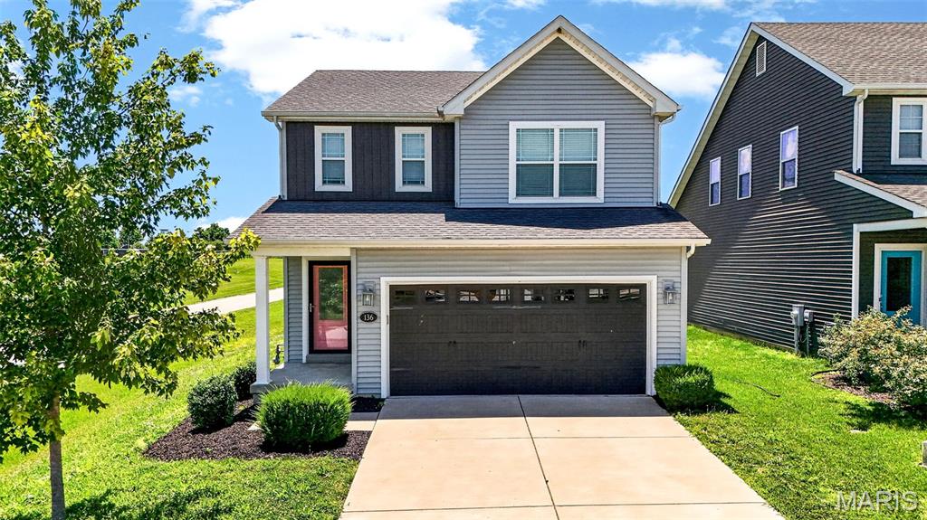 This charming Fischer & Frichtel cottage-style home is ready for its next owner! Built in 2018, this well-maintained 3-bedroom, 2.5-bath home with a 2-car garage offers a functional layout designed for both everyday living and entertaining. The main floor features an open-concept design with a spacious island kitchen, stainless steel appliances, and a pantry, all flowing seamlessly into the living and dining areas. Upstairs, you'll find three generously sized bedrooms, each with its own walk-in closet. The spacious primary suite boasts an oversized walk-in closet with plenty of room to share, while the convenient second-floor laundry room makes everyday chores a breeze. Step outside to enjoy the patio and fully fenced backyard—perfect for relaxing, entertaining, or letting kids and pets play. Yard also backs to plenty of common ground. The full basement includes a sump pump and an egress window, offering excellent potential for future finishing, including the possibility of a fourth bedroom. Freshly painted throughout and featuring brand-new carpet on the stairs and second floor, this move-in-ready home is one you won't want to miss. Ideally located just off Ohmes Road, you'll enjoy easy access to nearby walking trails, Woodlands Sports Park, and downtown Cottleville, making it simple to enjoy the outdoors and all the amenities the area has to offer.