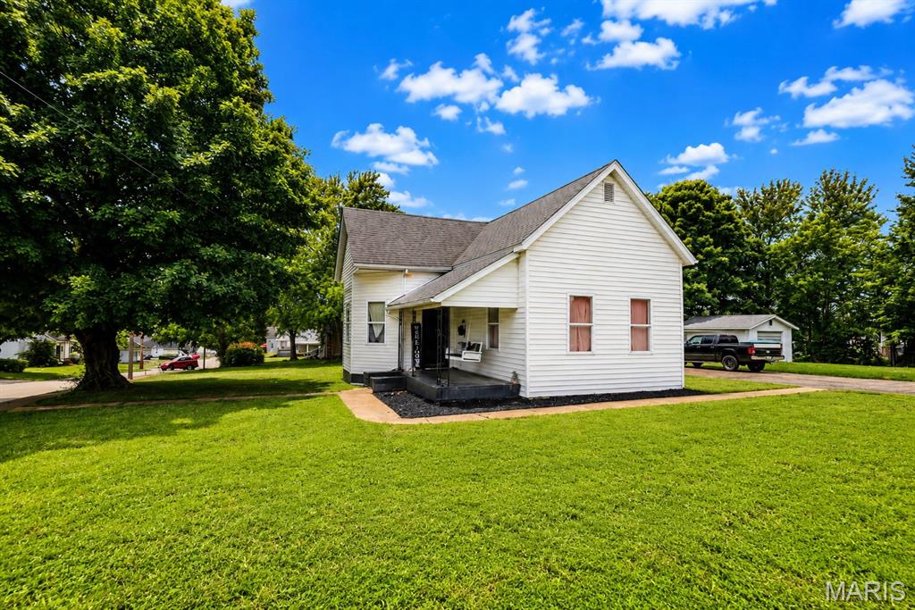 Welcome home to this beautifully updated 3-bedroom, 1-bath home situated on a spacious corner lot in the heart of Fredericktown. From the moment you arrive, you’ll appreciate the appeal, generous yard space, and multiple garage options that provide plenty of room for vehicles, hobbies, storage, and more.

Inside, you’ll find over 1300 square feet of comfortable living space featuring luxury vinyl flooring, abundant natural light, and a functional floor plan designed for everyday living. The updated kitchen offers a large center island, ample cabinet space, and room to gather with family and friends.

The home features three bedrooms and update's! central air, natural gas heating, public utilities, and a crawl space foundation. Outside, enjoy the privacy-fenced backyard with plenty of room for children, pets, gardening, or entertaining.

Additional highlights include a 2-car attached garage, detached garage, off-street parking, and a convenient location near schools, shopping, dining, parks, and everything Fredericktown has to offer.
If you’re looking for an updated home with space, storage, and a large corner lot, this one deserves a closer look. Schedule your private showing today!