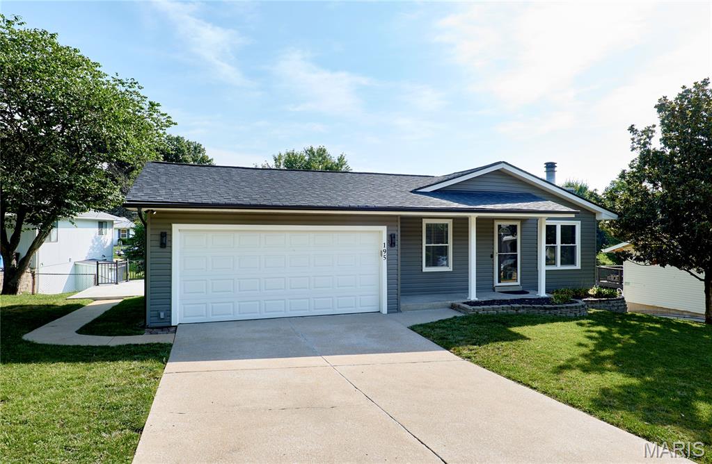 Welcome Home! This well-maintained 3-bedroom, 1.5-bath home offers the perfect blend of comfort, space, and functionality. Step inside to an inviting open-concept main living area featuring abundant natural light, and a cozy fireplace that's perfect for relaxing or entertaining. The kitchen provides plenty of cabinet and counter space, stainless steel appliances, and flows seamlessly into the dining and living areas. Downstairs, you'll find approximately 517 square feet of finished lower-level living space, providing the perfect area for a family room, recreation room, home office, workout space, or whatever best suits your needs. Outside, you'll appreciate the attached 2-car garage, covered front porch, and backyard with a patio that's perfect for grilling, entertaining, or enjoying your morning coffee.

Don't miss the opportunity to make this move-in-ready home your own. Schedule your showing today!