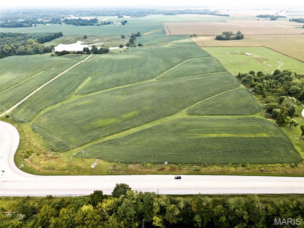 Huge commercial potential for this 84 acres.  Perfect location near I-55 which offers a lot of visibility. Located close to downtown Edwardsville. Front 15-acres offers around 300 feet of road frontage on 143. Currently zoned mixed-use commercial and this is located within the I-55 corridor. Utilities available at property line. Buyers to verify all MLS data. Location: City, Corner Location