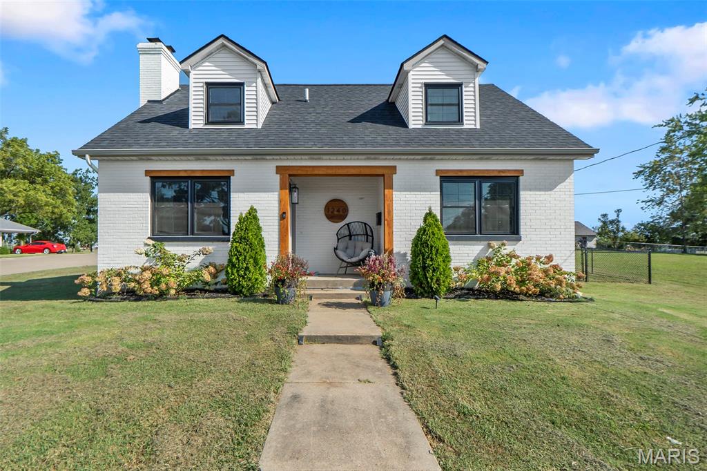 Welcome home to this beautifully maintained 3-bedroom, 2-bath all-white brick story-and-a-half home, offering approximately 1,955 square feet of comfortable living space. Located conveniently just a block away from Perryville Soccer park. 
The main level features a functional layout with main-level laundry, a warm and welcoming fireplace, and plenty of space for everyday living and entertaining. The kitchen is equipped with stainless steel appliances, offering a clean, modern feel. 

Recent improvements provide added peace of mind, including a new roof installed in 2025 and an updated HVAC system. Outside, enjoy a partially fenced backyard, perfect for relaxing, entertaining, gardening, or giving pets room to roam.

With its classic brick exterior, spacious floor plan, desirable updates, and convenient main-level amenities, this home is a wonderful blend of character and modern comfort. Don't miss the opportunity to make this charming property your new home!