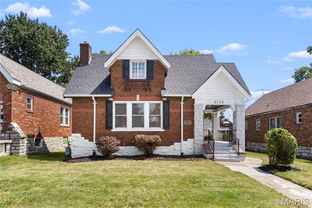 MOVE-IN READY WITH THE HEAVY LIFTING ALREADY DONE! Welcome to this remarkable 2-story, 3-bedroom, 2-bath ALL-BRICK home nestled in the charming McLaran Hills subdivision. Offering over 1,700 sq. ft. of living space, this beautifully updated home combines classic character with the major improvements today's buyers are looking for. BIG-TICKET UPDATES include a NEW ROOF, NEW GUTTERS, NEW PLUMBING INCLUDING NEW SEWER LINE, and NEW 200-AMP ELECTRICAL PANEL—giving the next owner peace of mind knowing many of the home's major systems have already been addressed! Step inside to beautiful refinished hardwood floors, picturesque windows providing plenty of natural light, and an elegant hearth fireplace. The renovated kitchen features new appliances and flows into a separate dining room perfect for entertaining. Two custom bathrooms, contemporary lighting, and thoughtful updates throughout make this home truly move-in ready. The finished lower level provides even more living space with a spacious recreation/game area, bonus room, walkout, utility area, and ample storage. Outside, enjoy a large deck and fenced backyard perfect for entertaining, pets, or family gatherings.
Conveniently located just minutes from I-70, Downtown St. Louis, shopping, restaurants, parks, and more. If you've been looking for an updated home where the costly work has already been completed, this home is for YOU!