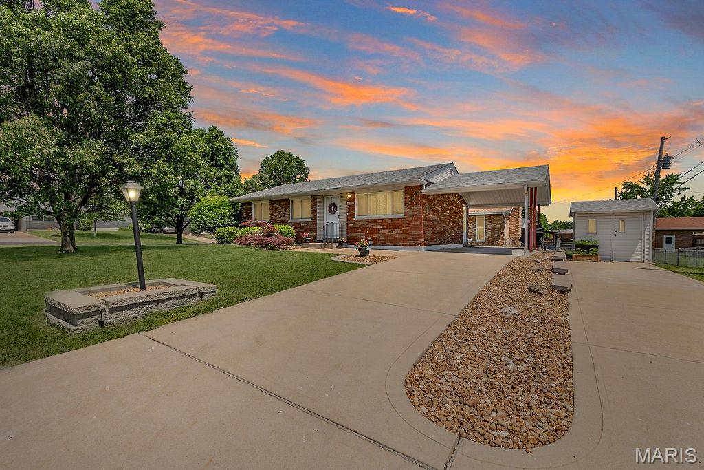 Welcome home! This charming South County all-brick home is situated on a large, flat corner lot. Inside, you’ll love the open layout, spacious eat-in kitchen with lots of storage and generously sized bedrooms offering comfort and functionality. Large windows throughout the home fill the space with natural light, creating a warm and inviting atmosphere. The partially finished basement adds even more living space with a versatile office or recreation area along with a convenient half bath. Outside features include a double driveway, carport, storage shed, and patio space perfect for relaxing or entertaining. Conveniently located close to the highway for easy commuting and only minutes from shopping, restaurants and more!