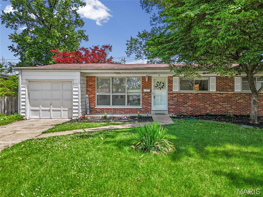 OPEN SUN 1-3PM | Discover cozy and convenient living at 14 Tamma Ln in Hazelwood, MO! Tucked away on a quiet cul-de-sac, this charming 3-bedroom, 1.5-bath ranch with a new roof 2026 offers the perfect blend of comfort, space, and accessibility. Step inside and be pleasantly surprised by the amount of space this home has to offer. Immediately you are greeted by an open living room glowing with natural light and beautiful hardwood floors which flow throughout much of the home. The kitchen features warm wood cabinets, updated appliances, and new counter tops! Down the hall, a full bath is conveniently located with an additional half bath off the primary bedroom. Inside each bedroom there are large windows, generous closet space, and updated fixtures. Downstairs the sprawling basement offers abundant storage and flexible bonus space perfect for entertaining, a home gym, office, additional sleeping room or recreation. Outside, enjoy an expansive fenced-in backyard, and a cozy sun room / screened-in back porch - perfect for relaxing year-round. With blooming new landscaping and tons of curb appeal, this house will surely draw you in. Convenient attached two-car garage with additional storage. Ideally located near parks, shopping, restaurants, popular coffee spots, and with easy access to Highway 270 and Lindbergh Boulevard, this home puts everything within reach! Move-in ready for YOU - seller is offering a ACHOSA Home Warranty and has a passed occupancy! CALL NOW