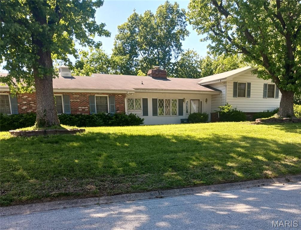 Great Godfrey location. This tri-level home needs rehabbing. Features include 3 bedooms, 2 bathrooms, and more. Situated on large wooded lot in desirable subdivision, but needs someone to love it. Property being sold as is condition.