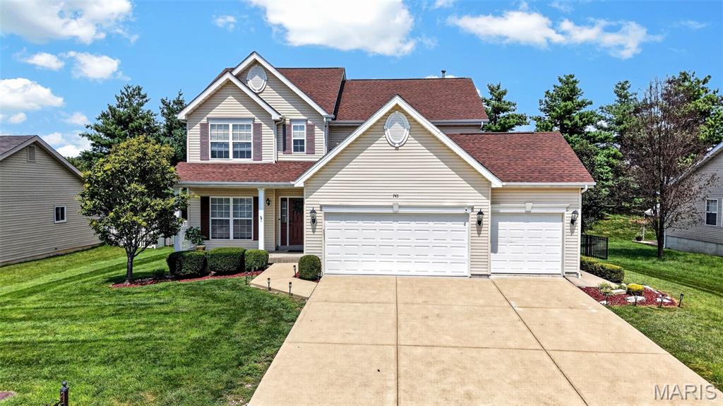 This beauty is back on the market; Seller is offering a $10,000 credit at closing, with an acceptable offer, which buyers may use towards, closing costs, rate buy-down, future roof replacement, or other home improvements. Welcome home to this beautifully maintained, move-in-ready residence offering over 3,300 square feet of thoughtful living space. From the moment you enter, you are greeted by a light-filled foyer, soaring 9-foot ceilings, and an inviting living room. The main level features a formal dining room ideal for entertaining, alongside a spacious family room anchored by a cozy gas fireplace and framed by oversized windows. At the heart of the home is a fully updated chef’s kitchen boasting sleek quartz countertops, a generous center island, 42-inch cabinetry, stainless steel appliances (including a brand-new microwave and garbage disposal), a large pantry, and rich hardwood floors. Adjacent to the light-filled breakfast nook, step outside onto the oversized deck overlooking a fully fenced backyard framed by mature trees—perfect for outdoor dining and summer gatherings. Just off the kitchen, you’ll find a convenient powder room, a functional mudroom with a coat closet, main-floor laundry, and direct access to the expansive three-car garage. Upstairs, newer carpeting flows through four generously sized bedrooms, each complete with its own walk-in closet. The primary suite serves as a true sanctuary, featuring vaulted ceilings and a spa-like en suite bath with a dual-sink vanity, soaking tub, separate shower, and a massive walk-in closet. The partially finished lower level expands your living space with a massive recreation room—ideal for a home theater, gym, or game room—plus a full bathroom, ample storage, and flexible space with potential for a future wet bar or kitchenette space. Key updates provide total peace of mind, including a brand-new HVAC system (Jan 2026), a 1-year-old water heater, and a durable architectural shingle roof. Located in the highly desirable Wentzville R-IV School District. Schedule your private tour today!