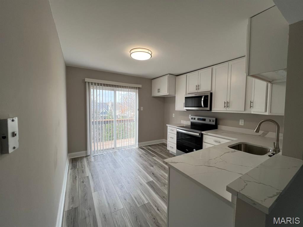 Renovated Two-Bedroom one Bath condo in Kirkwood! You'll find new flooring and neutral paint throughout the unit. The updated kitchen has lots of storage, granite countertops, and new stainless appliances. The bathroom was also renovated with a new tile tub surround. In-unit laundry and a newly built deck. Second floor unit. Located just steps from shopping, dining, nightlife, and ALL that Downtown Kirkwood has to offer. This one won't last long, call today! Longer leases are welcome! Please submit your information and Tenant Turner will reach out to you soon!