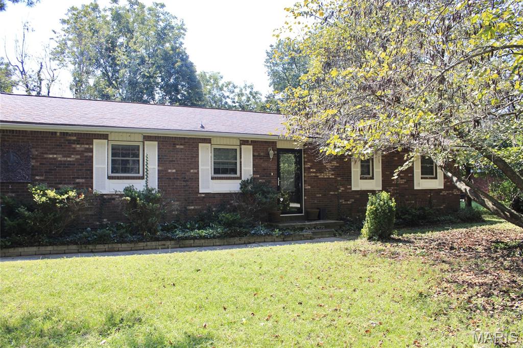 Priced to sell ! This 3 Bedroom, 2 Bath home sits on a 165 x121 corner lot. Spacious Living Room with Fireplace and open to a galley Kitchen with white cabinetry , all appliances stay including washer and dryer. Living area has a back door access leading to the huge fenced in Backyard with deck . down the oversized hallway you will find 2 bedrooms and full bath , also a master bath and bedroom with double closets for extra storage. Call today to schedule your tour !