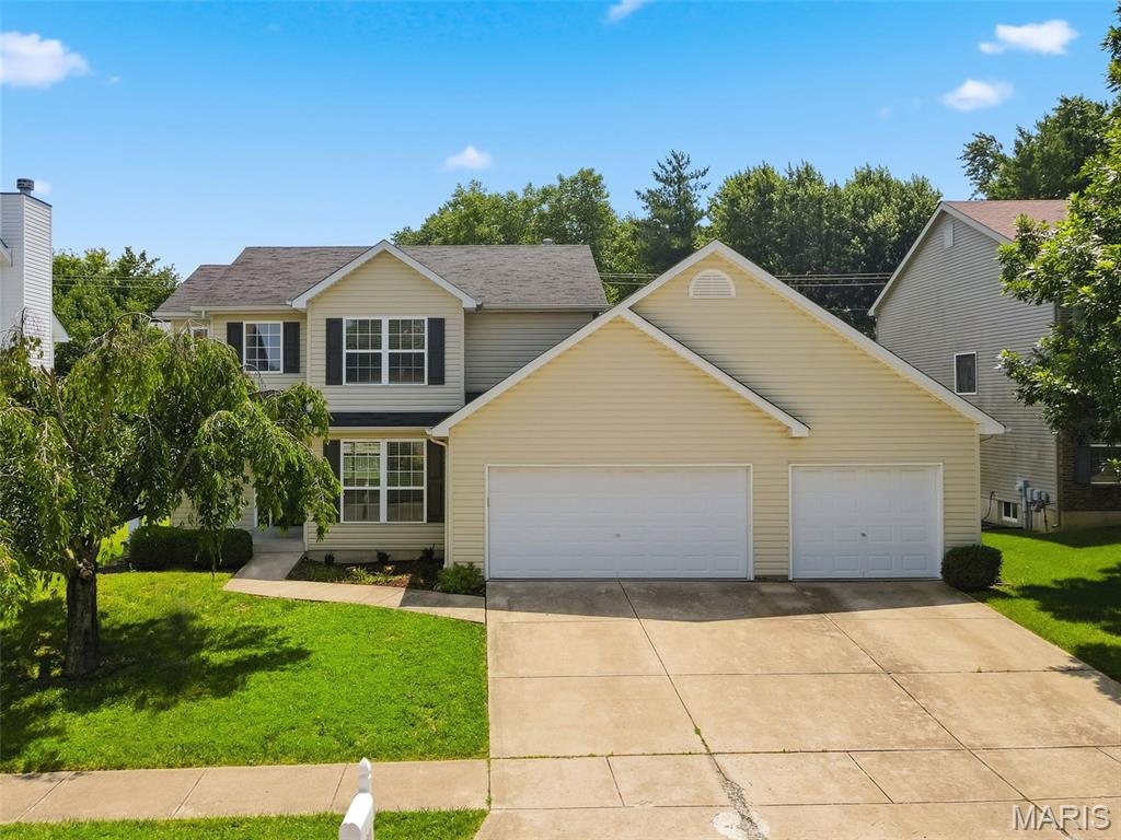 Meticulously maintained 2-story home with a very open floor plan, tons of windows, and an abundance of natural light throughout. The exterior features a welcoming wraparound covered porch, oversized 3-car garage, and fully fenced, level backyard.

Inside, you'll find a dramatic 2-story entry foyer and a spacious, open layout designed for everyday living and entertaining. New luxury plank tile flooring runs throughout the main level, and upgraded lighting adds a fresh, modern touch. The dining room offers a sculpted ceiling and wainscoting, while the spacious family room features a gas fireplace and large bay window. The breakfast room opens to a 14x14 patio, making it a great space for entertaining or relaxing outdoors.

The kitchen includes a center island, upgraded maple cabinets, built-in microwave, smooth-top range, and refrigerator. The main floor also offers a laundry room with washer and dryer included, plus a convenient half bath.

Upstairs are three generously sized bedrooms. The spacious primary suite features a vaulted ceiling, walk-in closet, and private bath with double sinks, separate shower, and garden tub.

Additional features include a freshly painted interior, upgraded lighting throughout, subdivision tennis courts, and a desirable location just one mile from Page Extension. Walking distance to Cottle Village with shopping, restaurants, and everyday conveniences nearby.