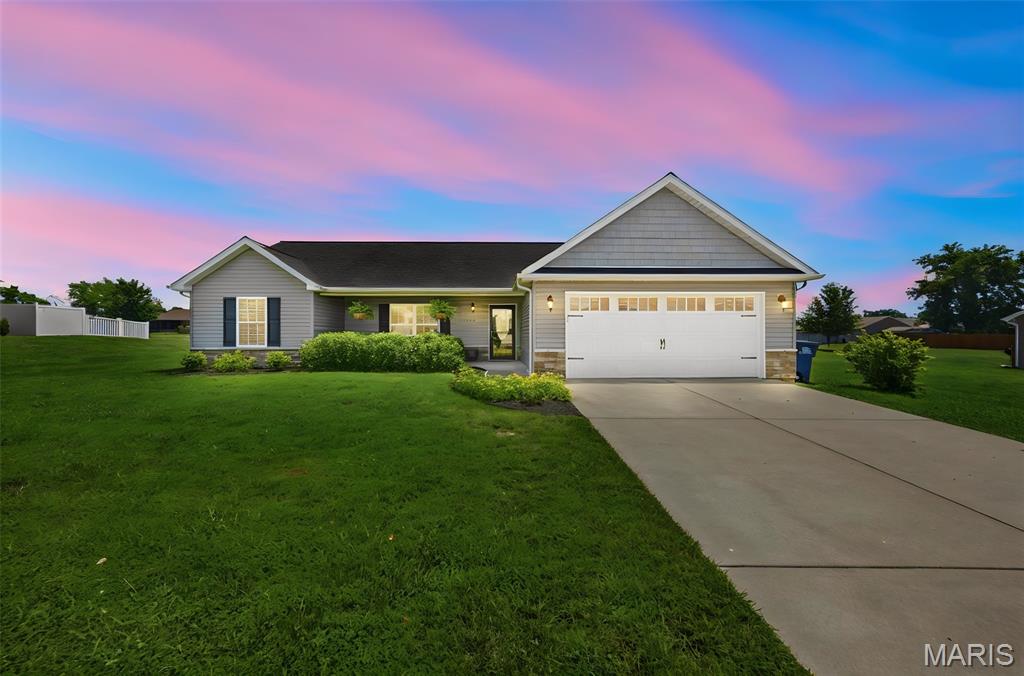 Welcome home to The Wolf Creek Crossings! Nestled in this beautiful rural subdivision, this immaculate 3-bedroom, 2-bathroom home offers the perfect blend of comfort, style, and modern living. From the moment you step inside, you'll be greeted by a bright, open-concept floor plan designed for both everyday living and effortless entertaining.

The spacious kitchen serves as the heart of the home, featuring ample cabinetry, generous counter space, and an inviting layout that flows seamlessly into the living and dining areas. The private primary suite is a true retreat, complete with a generously sized bedroom, an expansive en-suite bathroom, and a large walk-in closet.

Two additional bedrooms offer comfortable accommodations with excellent closet space, making them ideal for family, guests, or a home office. Step outside to enjoy the large, level backyard—perfect for relaxing, hosting gatherings, or creating your own outdoor oasis.

The attached two-car garage includes a convenient bonus utility/storage closet, providing even more space for organization. With its exceptional condition, thoughtful layout, and desirable location right outside Farmington City limits, this home is truly move-in ready. Don't miss your opportunity to make this stunning property your own!