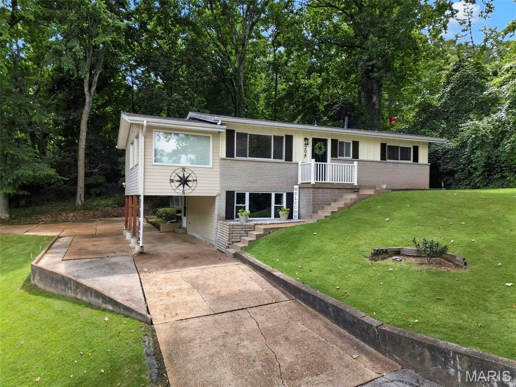 Seller is leaving the refrigerator, washer, and "like new 3-month old dryer" for you as well; making this truly a "move in ready" home.  

Welcome home to this fantastic 3-bedroom, 2-full-bath home tucked away at the end of the street, offering the perfect combination of comfort, privacy, and convenience! From the moment you arrive, you'll appreciate the oversized driveway with plenty of parking and a carport to keep your vehicle protected from the elements.

This home features year round exterior lighting making it stand out nicely in the evening. 

Step inside the front door and you will see the dark hardwood floors in the main living areas. The lower level features new carpet, creating a comfortable and inviting space that's perfect for a family room, recreation area, home office, or whatever best fits your lifestyle.

Enjoy over 1700 sq ft of total living space including the basement. The covered back deck is a wonderful private retreat where you can relax with your morning coffee, entertain friends, or unwind at the end of the day. And with the home sitting at the end of the street, you'll enjoy a level of privacy that's hard to find!

You'll also have peace of mind knowing the roof, gutters, and skylight in the kitchen are only one year old. The skylight features a powered shade that opens and closes, allowing you to easily control how much natural light enters the home.

With 3 bedrooms, 2 full bathrooms, great parking, a protected carport, hardwood flooring, new lower-level carpet, a private setting, and a fantastic outdoor living space, this home checks all the boxes!

Located in Arnold and packed with features, this is an opportunity you won't want to miss. So many restaurants, parks, retail shops, and the Arnold rec center so close by are just added bonuses to this home.  Schedule your showing today—because a home this appealing may not be available for long!  Open House this Wednesday 9-2-2026 4-6pm.