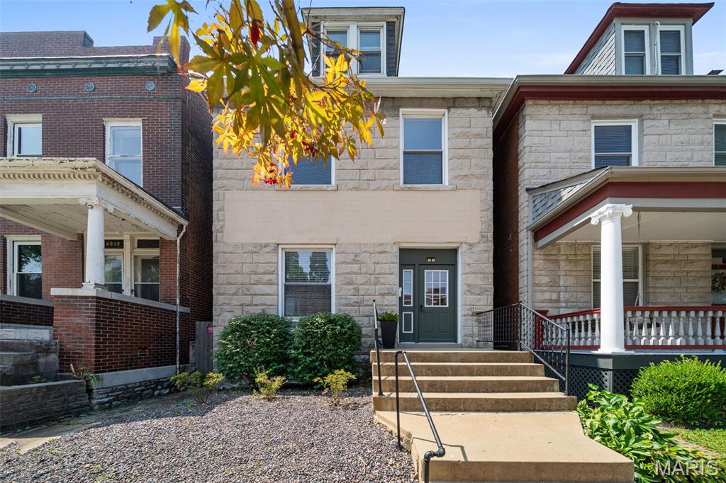 Rare opportunity to own a beautifully maintained duplex in the heart of Shaw, offering exceptional flexibility for both owner-occupants or investors. The expansive UPPER UNIT residence spans the second and third floors, living more like a single-family home with an open, inviting layout. It features three spacious bedrooms plus a large walk-in closet with the potential to become a fourth bedroom, home office, den, second bathroom, or laundry room. A striking three-quarter-turn staircase connects the living spaces, leading to an updated full bath with a tiled shower, an attractive renovated kitchen, and generous living and dining areas. The MAIN LEVEL UNIT furnished 1 bedroom apartment offers a bright, flowing floor plan with hardwood floors, living room, dining room with day bed for flexible additional guests, an updated kitchen, and a renovated bathroom—making it equally appealing for short-term tenants or an owner seeking one-level living. Each unit enjoys its own private rear deck overlooking the fenced backyard, creating inviting outdoor space for relaxing or entertaining. Located just blocks from the Missouri Botanical Garden and Tower Grove Park, you'll love easy access to Food Truck Fridays, the renowned Tower Grove Farmers' Market, neighborhood restaurants, and all that one of St. Louis' most sought-after neighborhoods has to offer. All appliances for both units are included, making this truly a move-in-ready, turnkey investment.
