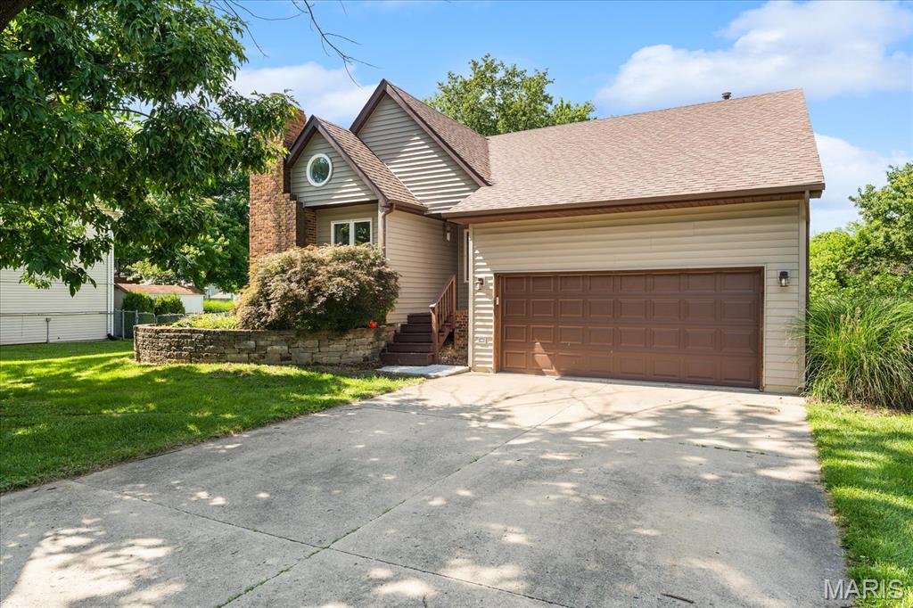 Move right into this well-maintained Maryville home offering three finished levels of living space, 3 bedrooms, 3 bathrooms, and a desirable walk-out basement. The functional floor plan provides plenty of room to spread out, with a spacious living room featuring vaulted ceilings and a cozy gas fireplace. The kitchen is equipped with a center island, updated lighting, abundant cabinet space, and all appliances are included. The finished walk-out lower level expands your living space with a large family room that easily accommodates both a media area and a rec room, home office, or play space. You'll also find a convenient half bath and an oversized laundry/storage room. Step outside to enjoy the fully fenced backyard from the oversized deck or lower-level patio. With plenty of room for a pool, playset, pets, gardening, or entertaining, the backyard offers endless possibilities. Located just minutes from Maryville Elementary School with quick interstate access for an easy commute. Additional updates include a new water heater (December 2025). This move-in-ready home combines space, functionality, and a fantastic location—don't miss your opportunity to make it yours!
