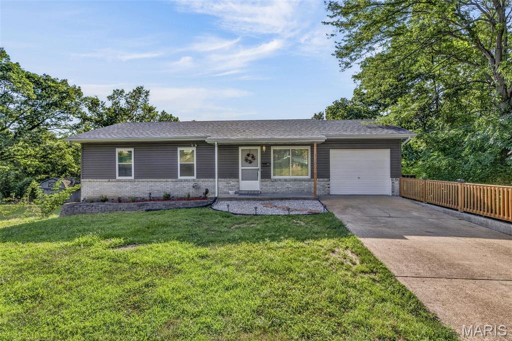 Beautifully updated 4 bed/ 2 bath, offering over 1,800 sq ft of comfortable living space. Sitting on over .5 acres, with an expansive yard. Thoughtfully renovated throughout, this move-in-ready home features granite countertops, fresh paint, and brand-new flooring in the finished walkout basement. Not to mention the newer roof, siding, & water heater, and brand new HVAC. Elegant wainscoting & abundant natural light enhance the living space. The finished walkout basement provides additional versatile living space, perfect for a family room, recreation area, home office, or guest suite. Also offers a huge storage room. As an added bonus, a home warranty is offered through November 2027, providing extra confidence & peace of mind. With modern updates, generous living space, and a large lot, this exceptional property is ready to welcome you home. *Agent- Owned* Showings begin Saturday 7/4. Open House Sunday 7/5 1-3pm