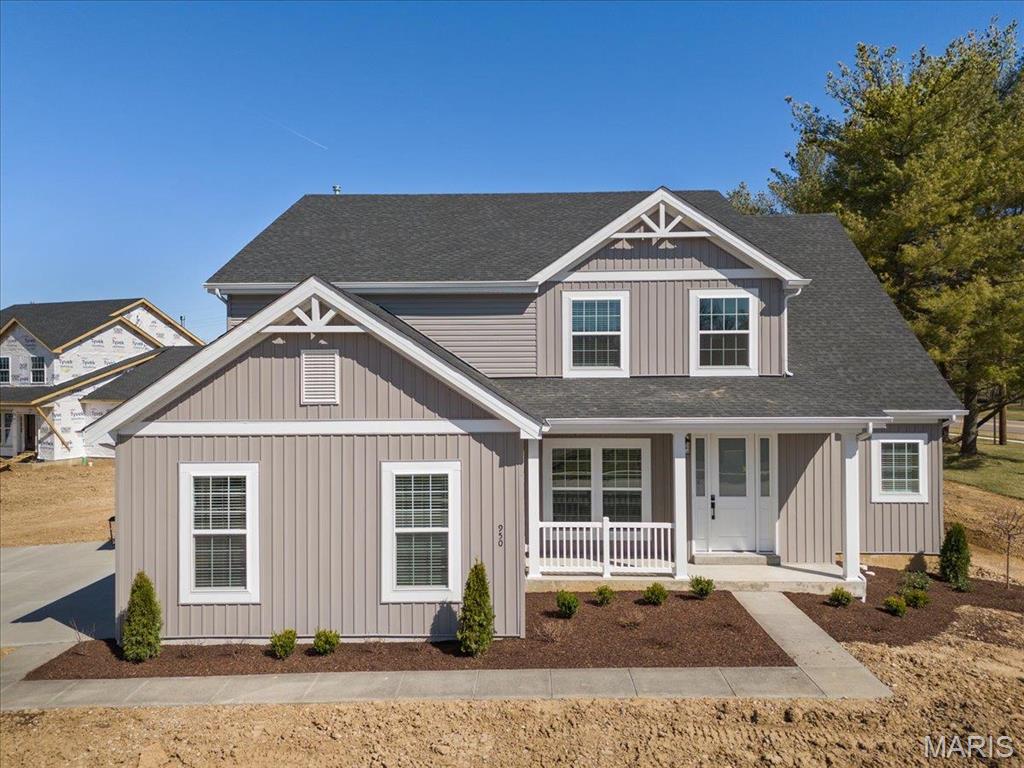 This exquisite newly built home with a 3-car side-entry garage blends elegance and comfort! The two-story great room features a breathtaking window wall, 9ft ceilings, 6ft windows, and hardwood flooring throughout the main level. The gourmet kitchen boasts white cabinetry, stacked glass cabinets, quartz countertops, a large island, and GE stainless steel appliances with a 36” cooktop and double oven. Retreat to the main-level master suite with dual walk-in closets and a spa-like bath featuring a soaking tub, walk-in shower, and dual vanities. Upstairs, a Jack & Jill bath connects two bedrooms, while a third enjoys a private bath. A spacious bonus room offers endless possibilities—perfect for a home office, playroom, or media space. Additional highlights include a dual-zone HVAC, open spindled staircase, main-floor laundry with cabinets, and stylish interior paint. Situated on a generous 1/2 acre lot in Tara Ridge, this home offers plenty of outdoor space to enjoy.