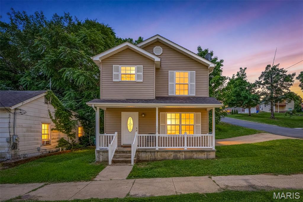 This charming small two-story home sits proudly on a desirable corner lot, offering extra yard space, added privacy, and curb appeal. You will first notice the welcoming front porch and natural light as you enter the front door. Inside, the thoughtfully designed layout makes excellent use of space, with comfortable living areas, abundant natural light, and a cozy atmosphere throughout. The upper level provides private bedrooms and a peaceful retreat, while the corner lot setting allows for a spacious top yard and convenient parking.  This home is the Perfect blend of comfort, character, and convivence.  This home is being sold AS-IS and will need new paint and flooring throughout the house.
