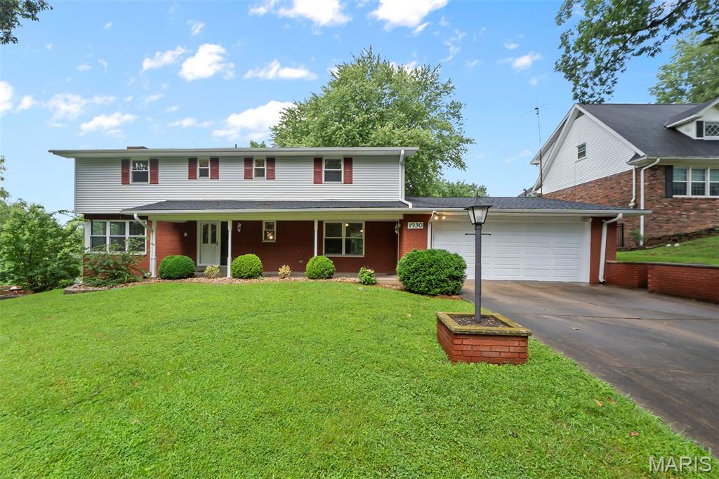 Welcome to 1930 Oak Hills Drive in Cape Girardeau, a spacious 5-bedroom, 4.5-bath home offering approximately 3,673 square feet of finished living space.

Fully renovated in 2022, this home combines generous room sizes with thoughtful main-level convenience, including a primary suite, laundry, and a bright four-season sunroom with ample windows, heating, and cooling. The main living area features a gas fireplace, while a second gas fireplace adds warmth and character to the lower level.

With multiple bedrooms, flexible living areas, and plenty of space for guests, hobbies, home offices, or multigenerational living, the layout offers options for a variety of needs. The roof was replaced in July 2022, and the kitchen appliances will remain with the home.

Located in an established Cape Girardeau neighborhood, this beautifully updated home offers space, comfort, and versatility throughout.

Schedule your private showing today!