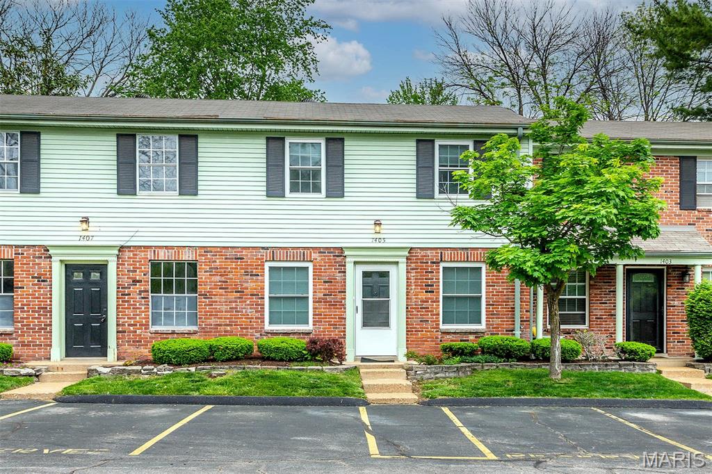 Super affordable townhome in top rated Rockwood school district! Situated in a popular planned community with lush vegetation and open spaces, appliance replacements since 2019 including furnace and A/C with heat pump upgrade, tilt-in windows, Levolor blinds, water heater, bath updates, and washer/ dryer. Kitchen has maple cabinetry with refrigerator and pantry, plus room for dining area. Convenient main floor laundry. Newer lighting and walk-in closet are a bonus. Privacy fence gives exclusive use of rear courtyard, perfect for a pet! Open field beyond fence is great for playtime. Lake close by allows fishing, and plenty of sidewalks and woods for exercise. Monthly fee covers water, sewer, trash and exterior maintenance. 2 parking spaces in front of unit, 1 is assigned, plus plenty of guest parking.  Fresh painting and new luxury vinyl flooring through out.  Alumicon remediation completed August 2024.