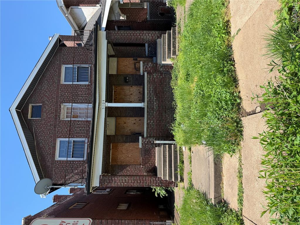 Solid two family in North St Louis City, needs full rehab, could be turned into 23 bedroom units. Bring your idea. Close to highways, public transportation, schools, hospitals, and stores.