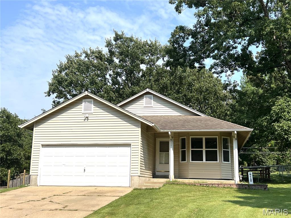 Tucked away at the edge of town, this charming 3-bedroom, 2-bath home offers the perfect blend of comfort, privacy, and convenience. Walking in your welcomed with a bright and inviting living room featuring beautiful bay window accents that fill the space with natural light. The kitchen and dining area offer an open, functional layout with plenty of cabinetry and additional natural light from a second bay window, and convenient access to the back deck—perfect for relaxing or entertaining. Down the hallway, you’ll find two bedrooms with large closets, a full guest bathroom, and a comfortable primary suite complete with another generous closet and its own private bathroom. Outside, enjoy the peaceful, fenced backyard plus a storage shed and greenhouse that conveys with the sale. Situated on at the end of a quiet street with virtually no traffic, this home offers a lovely setting while still being close to all the amenities St. James has to offer. Don’t miss the opportunity to make this charming home your own—schedule your private showing today!