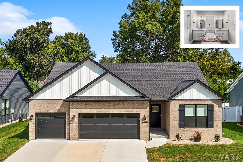 Classic curb appeal meets thoughtful, modern living in this beautifully maintained, better than new Mascoutah home, featuring a timeless brick front, open floor plan, and an impressive newly finished basement. Vaulted ceilings span the living room and kitchen, creating an airy, open feel while luxury vinyl plank flooring and a gas fireplace flanked by built-ins add both style, warmth and consistency to the main living space.
The kitchen is designed to be both beautiful and functional, offering quartz countertops, a center island, and a walk-in pantry with plenty of storage. A desirable split-bedroom layout provides privacy, with a spacious primary suite featuring dual vanities, large soaking tub, an oversized shower, and walk-in closet, while two additional bedrooms offer upgraded carpeting. Just off the garage entry, a dedicated drop zone and main-level laundry add thoughtful, everyday convenience and organization.
The recently finished lower level adds an entirely new dimension of living space, complete with a dedicated office, fourth bedroom, full bath, and secondary living area—ideal for guests, a home office, recreation, or everyday flexibility. An unfinished section provides exceptional storage and offers the opportunity for future expansion. With space, updates, and flexibility in all the right places, 704 Mortar is a home that delivers far beyond the expected