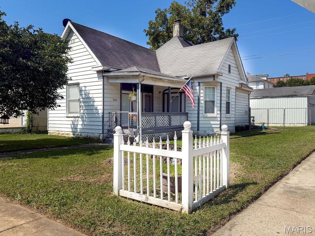 Charming Victorian-style home located in the heart of De Soto! This highly walkable neighborhood places you just minutes from local dining, shops, entertainment, and a park. Inside, soaring high ceilings create a bright, nostalgic ambiance throughout the home. Enjoy 3 comfortable bedrooms (including a 3rd main-level sleeping area) Relax on the cozy covered front porch—perfect for quiet mornings or relaxing evenings. Outside, the fully fenced backyard features a back deck, a storage shed and a massive detached garage, offering incredible space for parking, extra storage, or a dedicated workshop. Don't miss out on this fantastic property!
Home is being sold "AS IS".
Please verify school as DeSoto has moved to separate campuses.