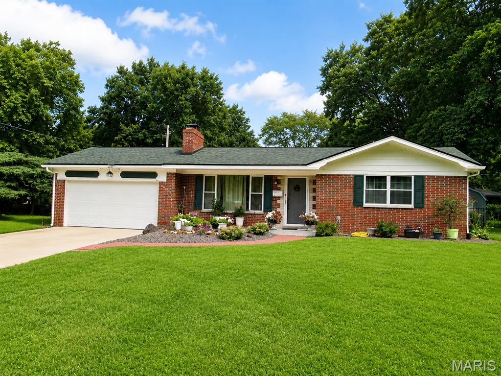 This charming 2-bedroom home offers beautiful hardwood floors, a cozy fireplace, and a 2-car attached garage. Situated on a spacious 85' x 120' lot, the property provides plenty of outdoor space to enjoy. With its inviting features and great potential, this home is ready for its next owner. Seller prefers to sell the property as-is.